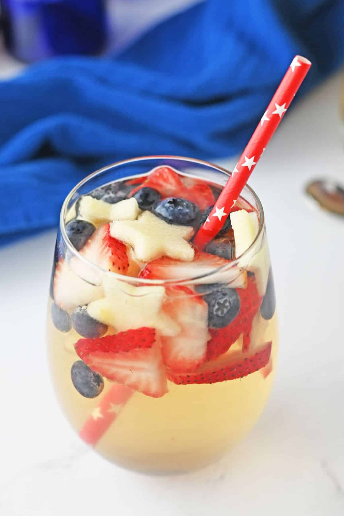 stemless wine glass with red white and blue fruit