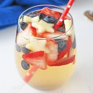 white sangria with red white and blue fruit