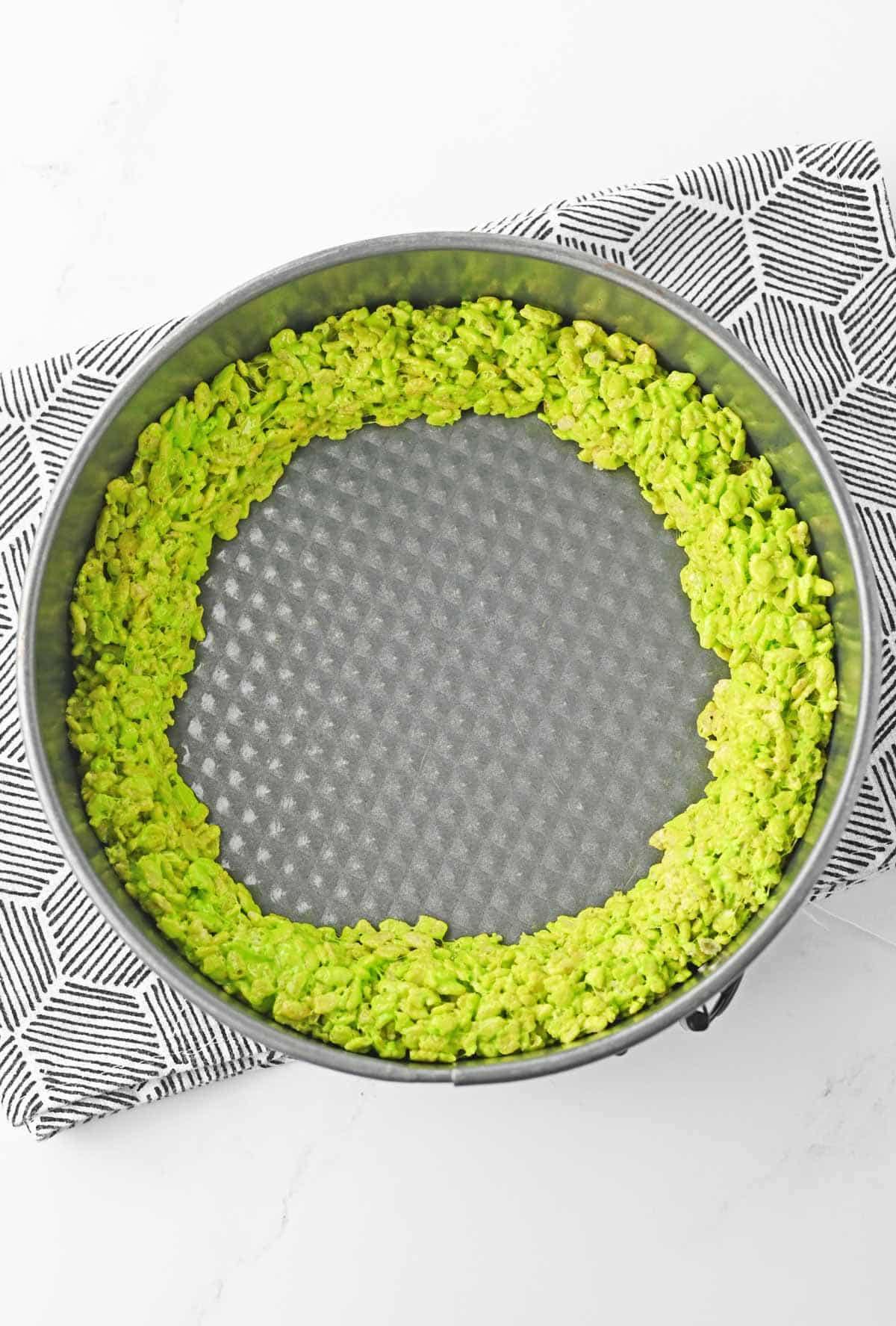 green rice krispies ring in round cake pan