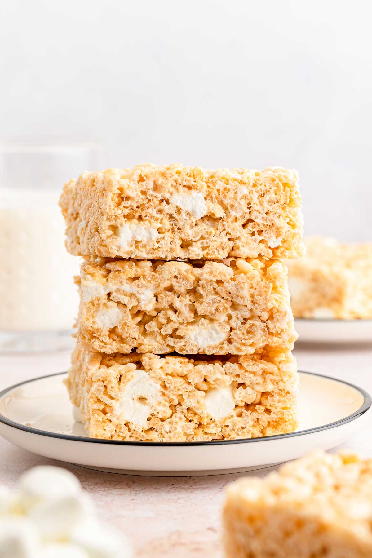 A tower of Easy Rice Krispie Treats on a white plate