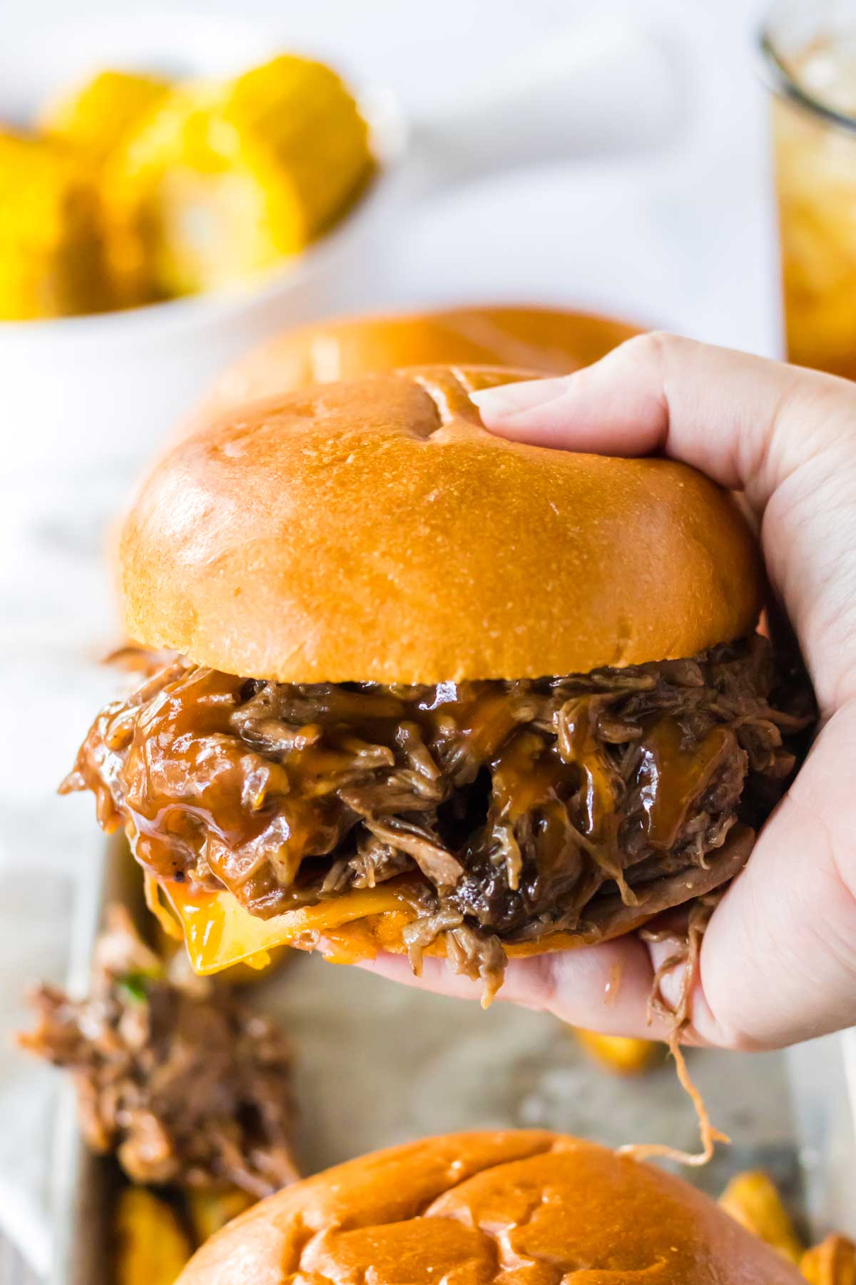 A handful of Slow Cooker BBQ Beef Sandwich with tender pulled pork