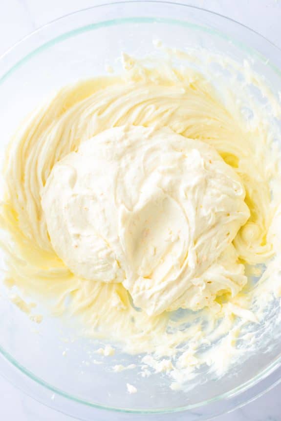 cream cheese mixture in glass mixing bowl