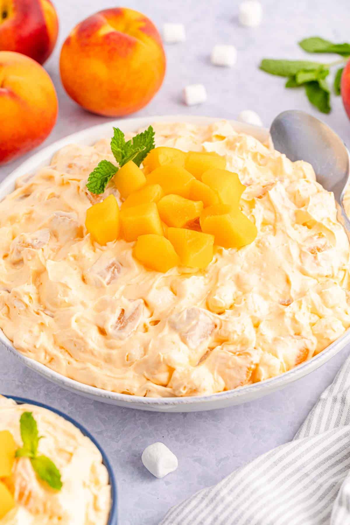 Fluffy orange "fluff" with chopped peaches