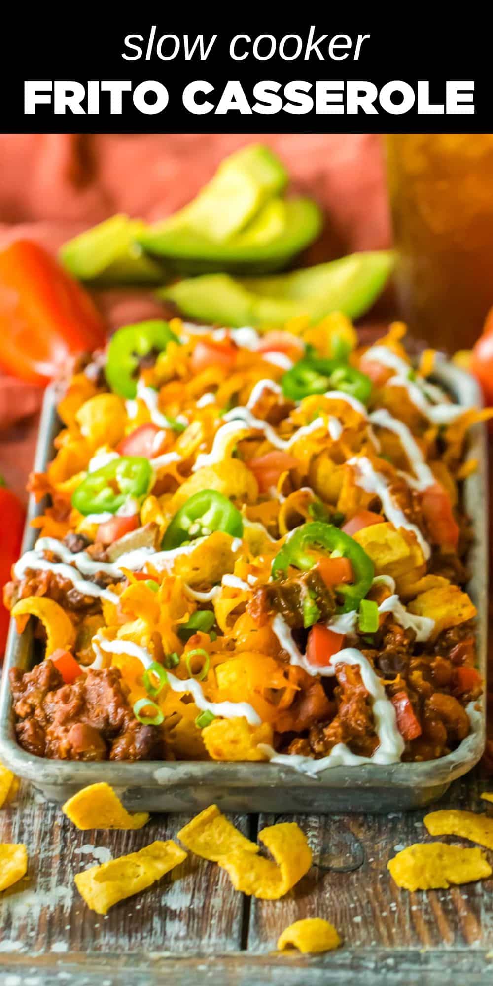 This Slow Cooker Frito Casserole features a delicious homemade chili that slow cooks to perfection before getting topped with crunchy Frito corn chips and gooey cheese. Served with all your favorite toppings, this casserole is comfort food at its finest!  
