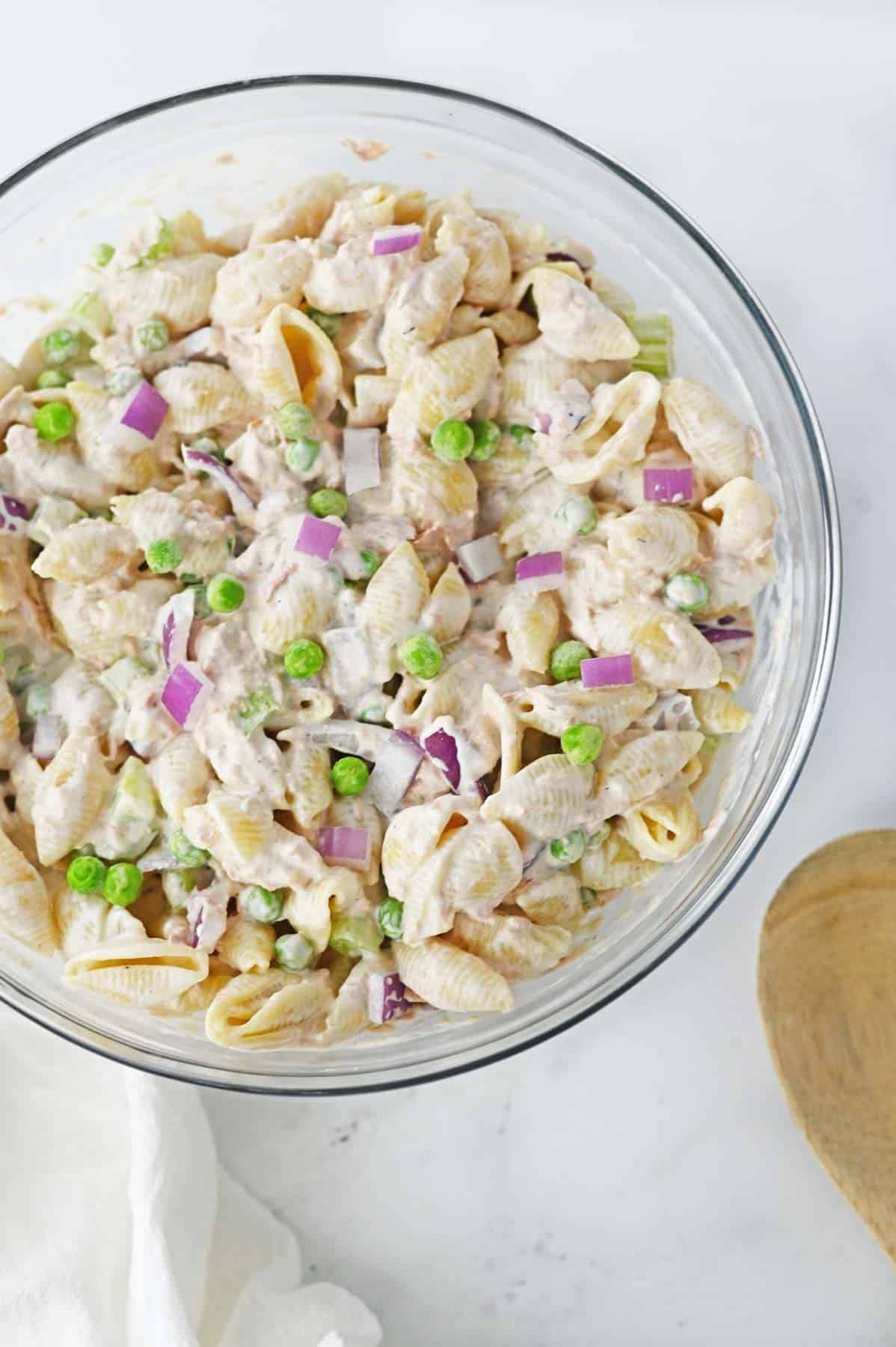 glass bowl with tuna pasta salad on counter