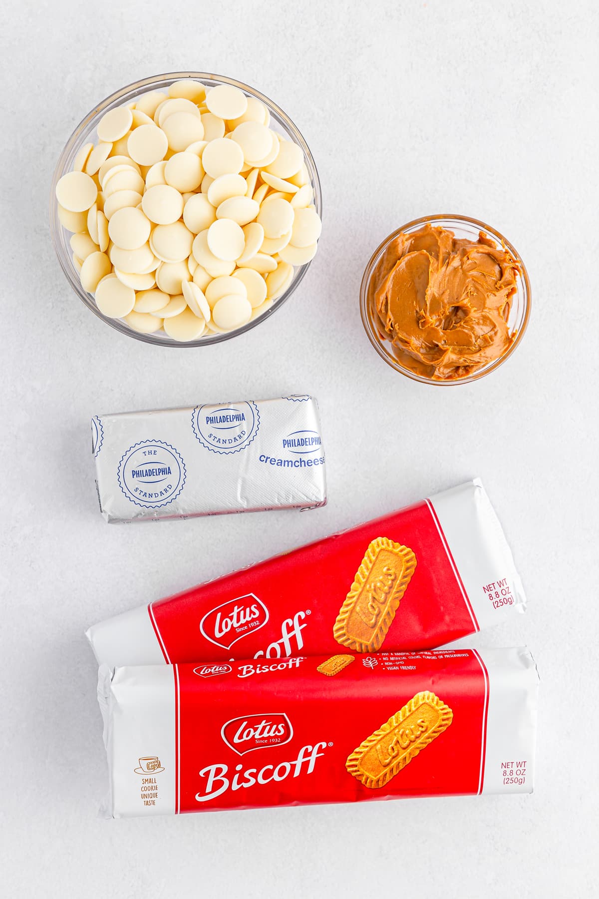 Ingredients for the Biscoff Truffles include, Biscoff cookies (the rectangle ones without cream), cream cheese softened to room temperature, ghirardelli vanilla melting wafers and Biscoff cookie butter spread