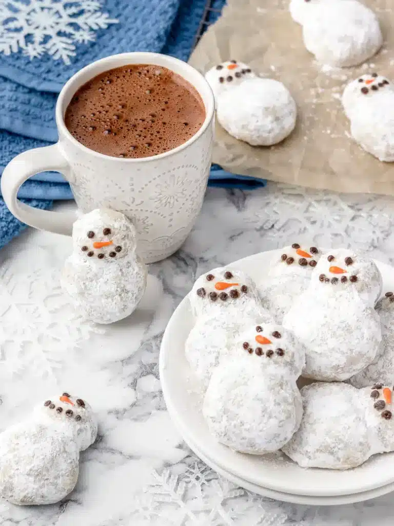 snowman snowball cookies and hot chocolate