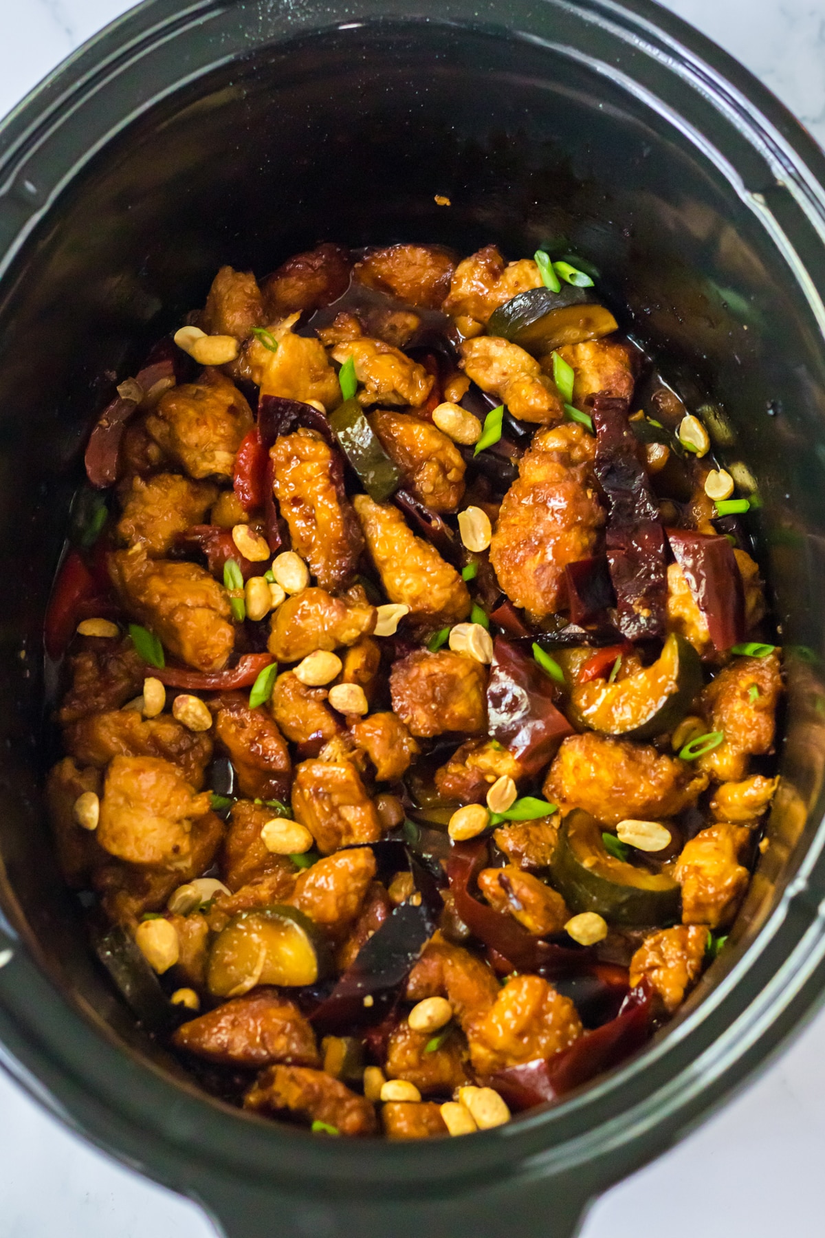 Cook the Slow Cooker Kung Pao Chicken for 4 hours.