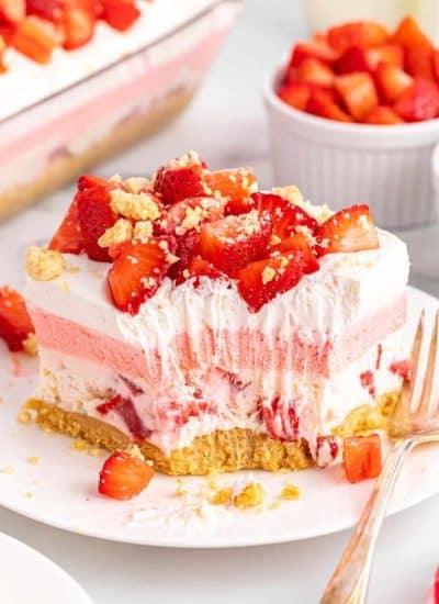 A slice of strawberry ice cream pie on a plate.