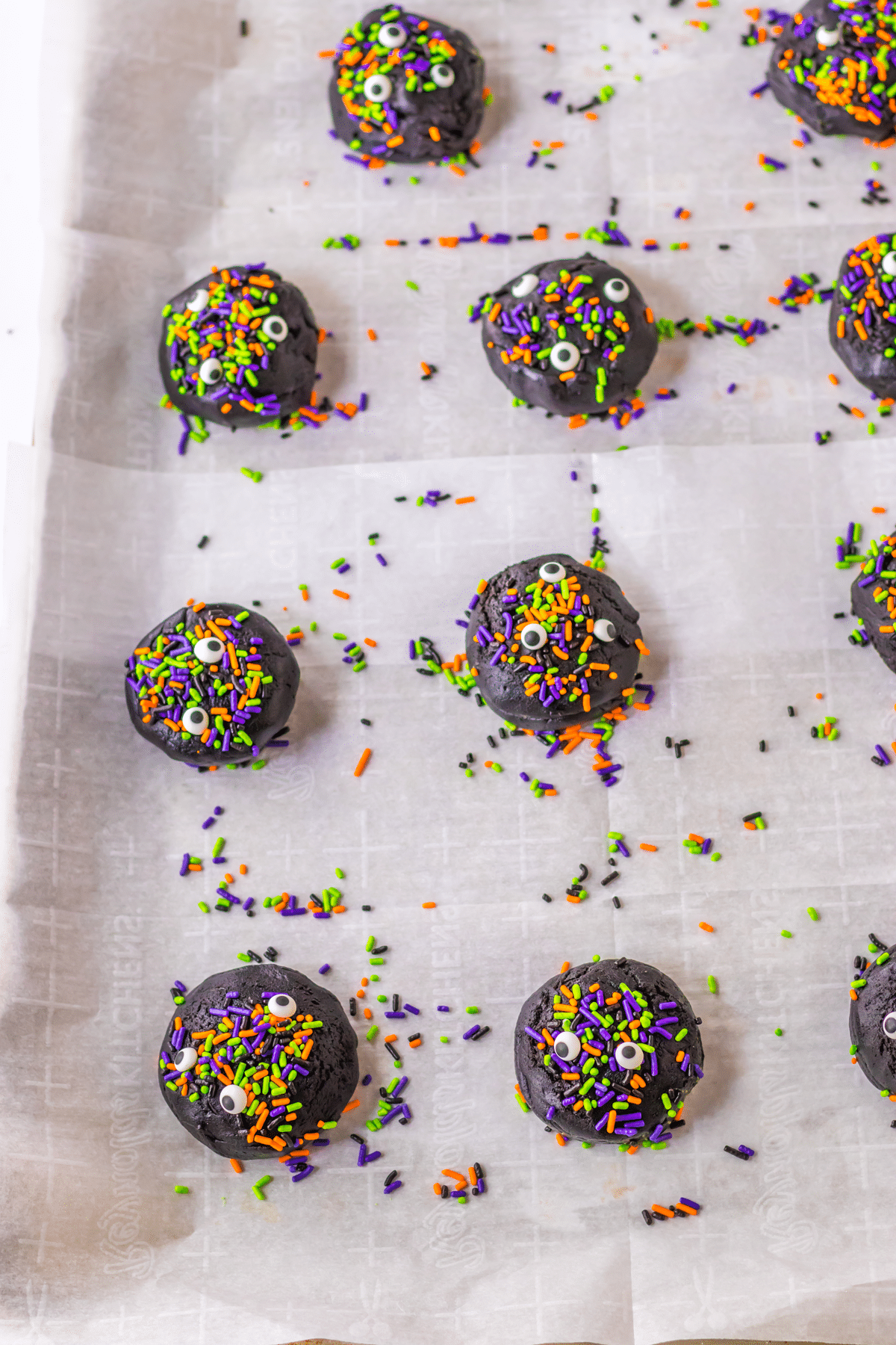 Another process in making Halloween Black Velvet Cookies is to chill the balls and add sprinkles into them.