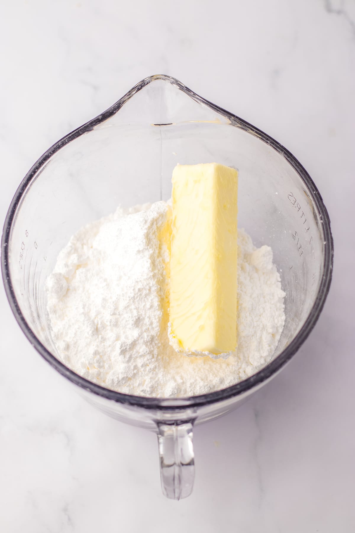 Butter and flour in a glass bowl.
