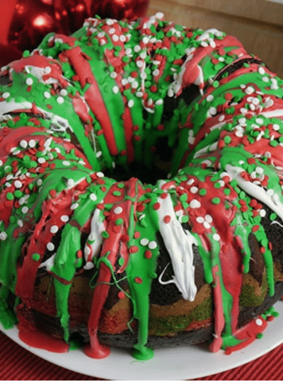 A christmas bundt cake with green and red icing.