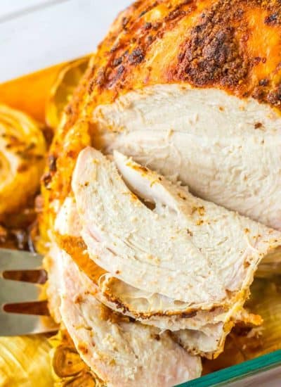Classic roast turkey breast in a baking dish.