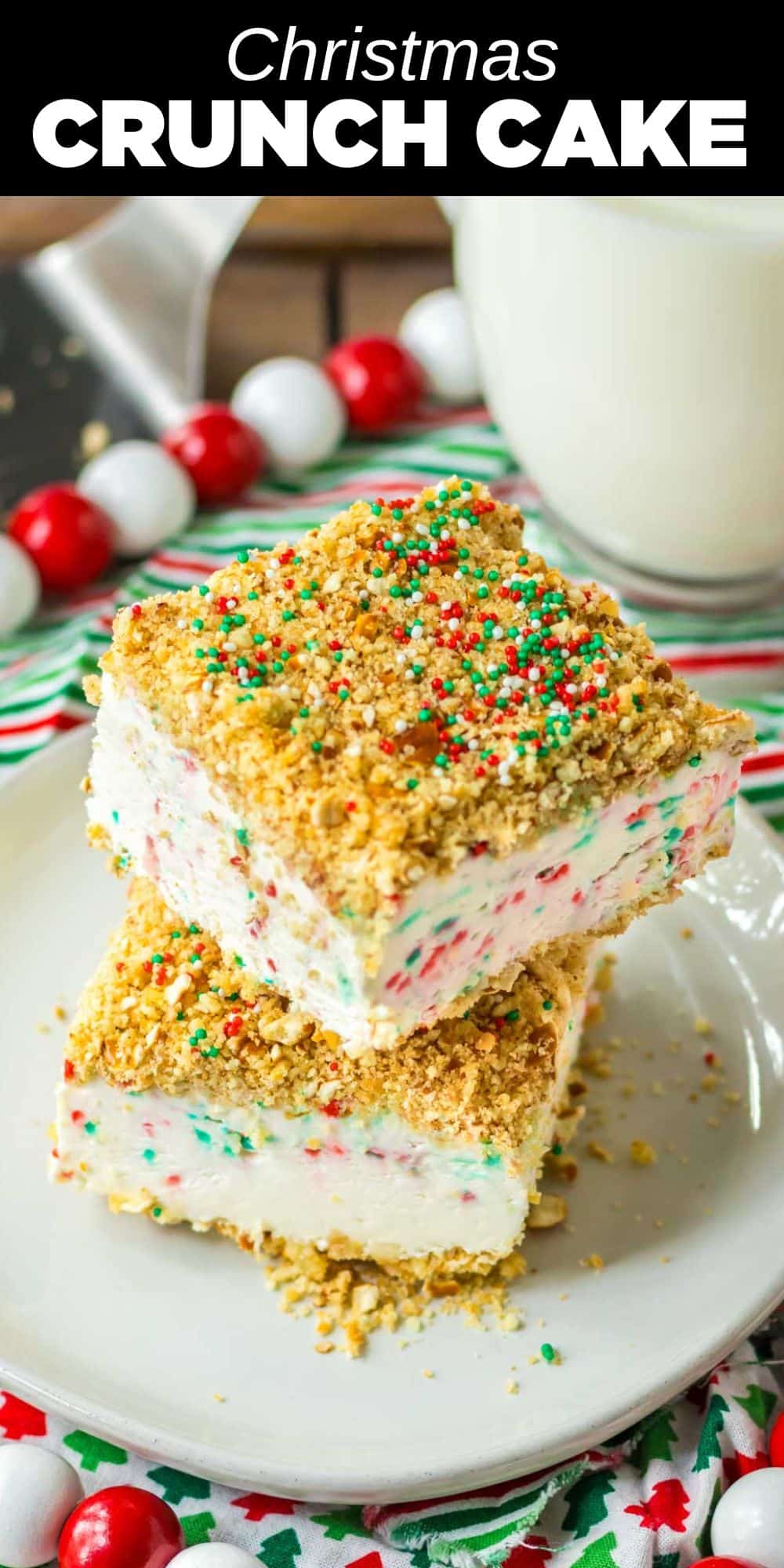 This Christmas Crunch Cake is an easy yet impressive dessert that’s ideal for the holiday season. Part creamy cheesecake, part frosty frozen dessert, this festive treat is sure to get everyone in the holiday spirit.