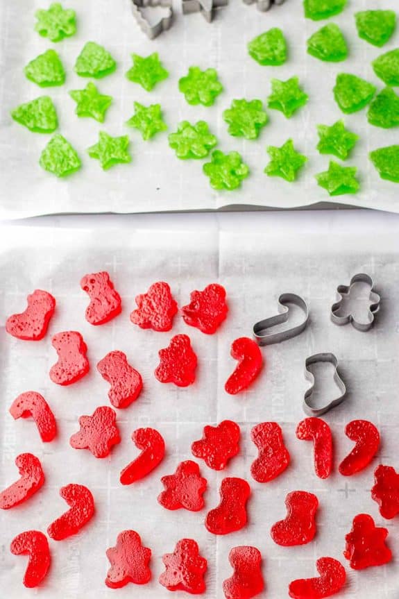 Christmas cookie cutters with red and green gummy hearts.