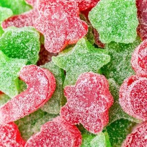 A close up of red, green, and white Christmas gumdrops.