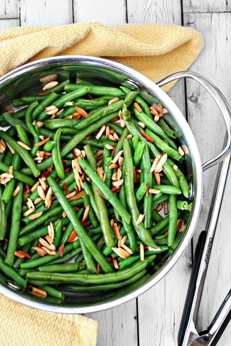 Green beans with almonds, a prime rib side dish option.