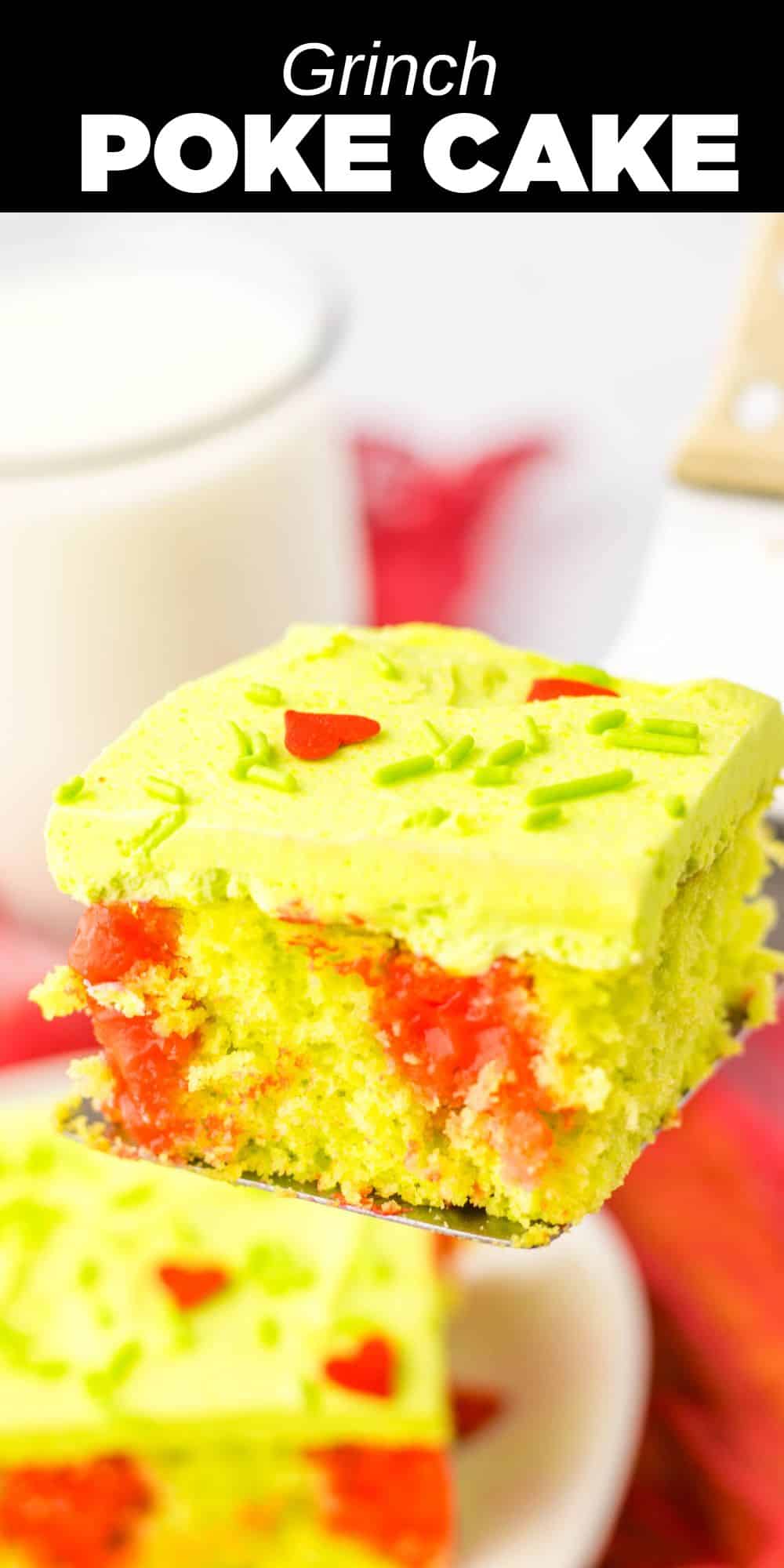 Celebrate the holiday season with this fun and festive Grinch Poke Cake. A vibrant green, moist cake is filled with red cheesecake pudding and topped with creamy buttercream frosting. Heart sprinkles are added to create the perfect Christmas dessert!