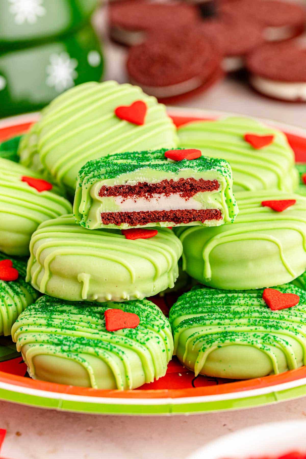 Green Grinch Oreos on a plate.