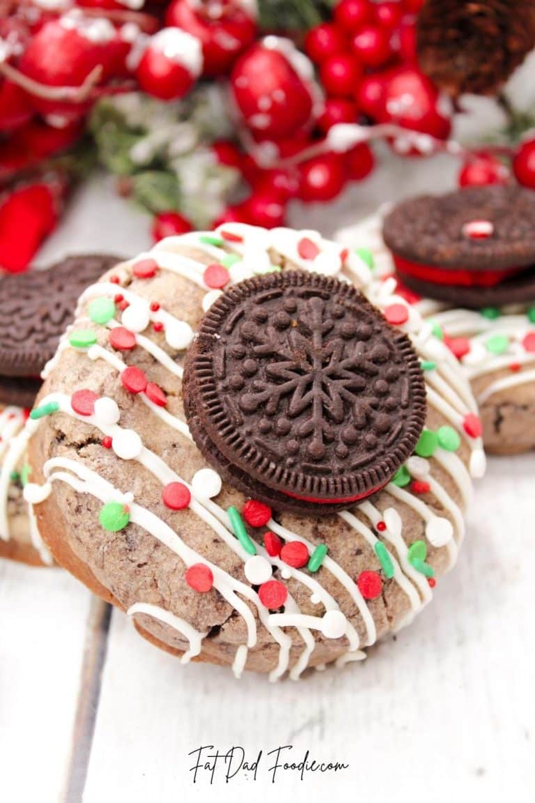 Oreo cookies with icing and christmas decorations.