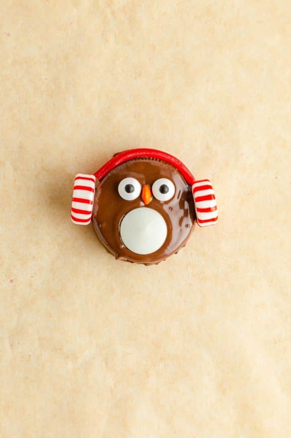 An Oreo penguin with peppermint ear muffs