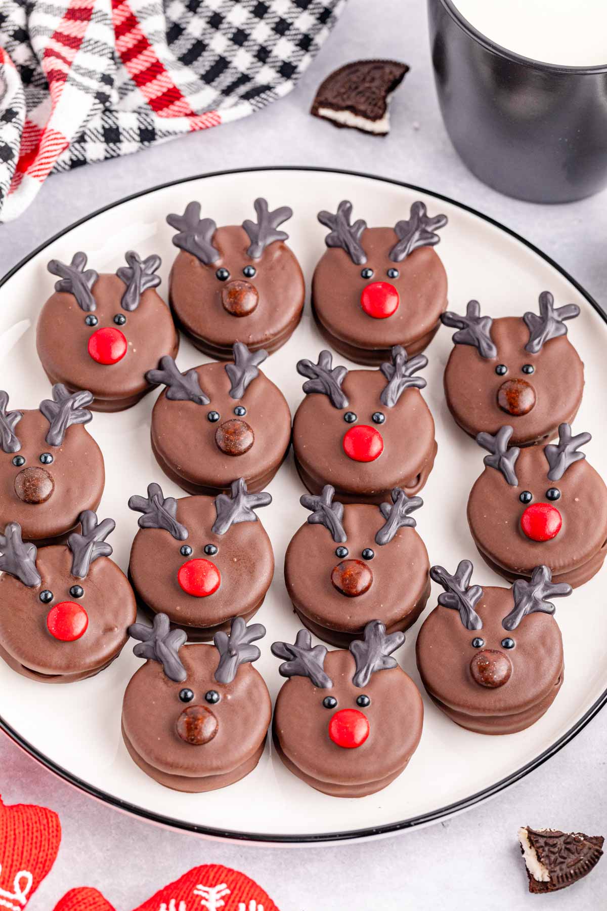 Chocolate reindeer cookies on a plate.