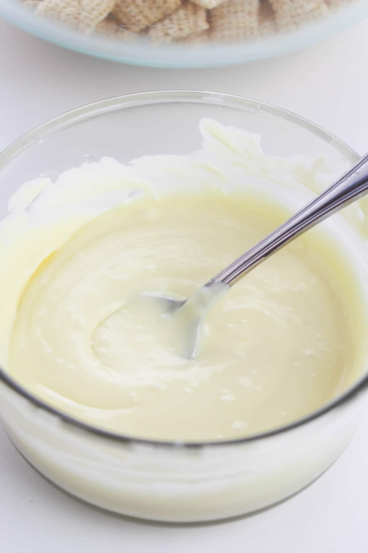 A bowl of melted white chocolate.