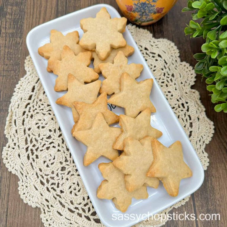 Star shaped cookies on a white plate.