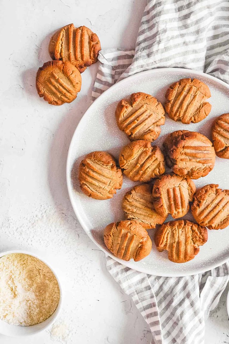 Peanut butter cookies on a white plate.