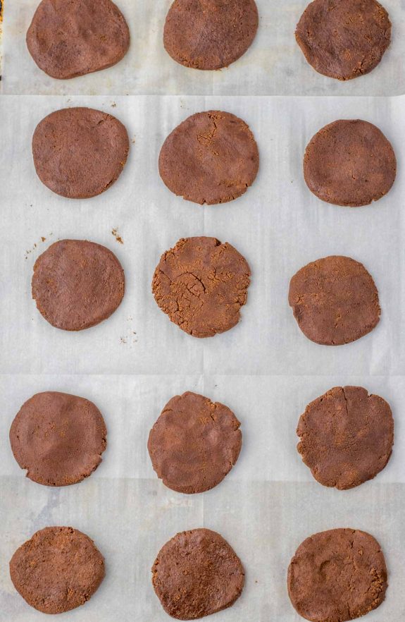 Chocolate cookies on a baking sheet.