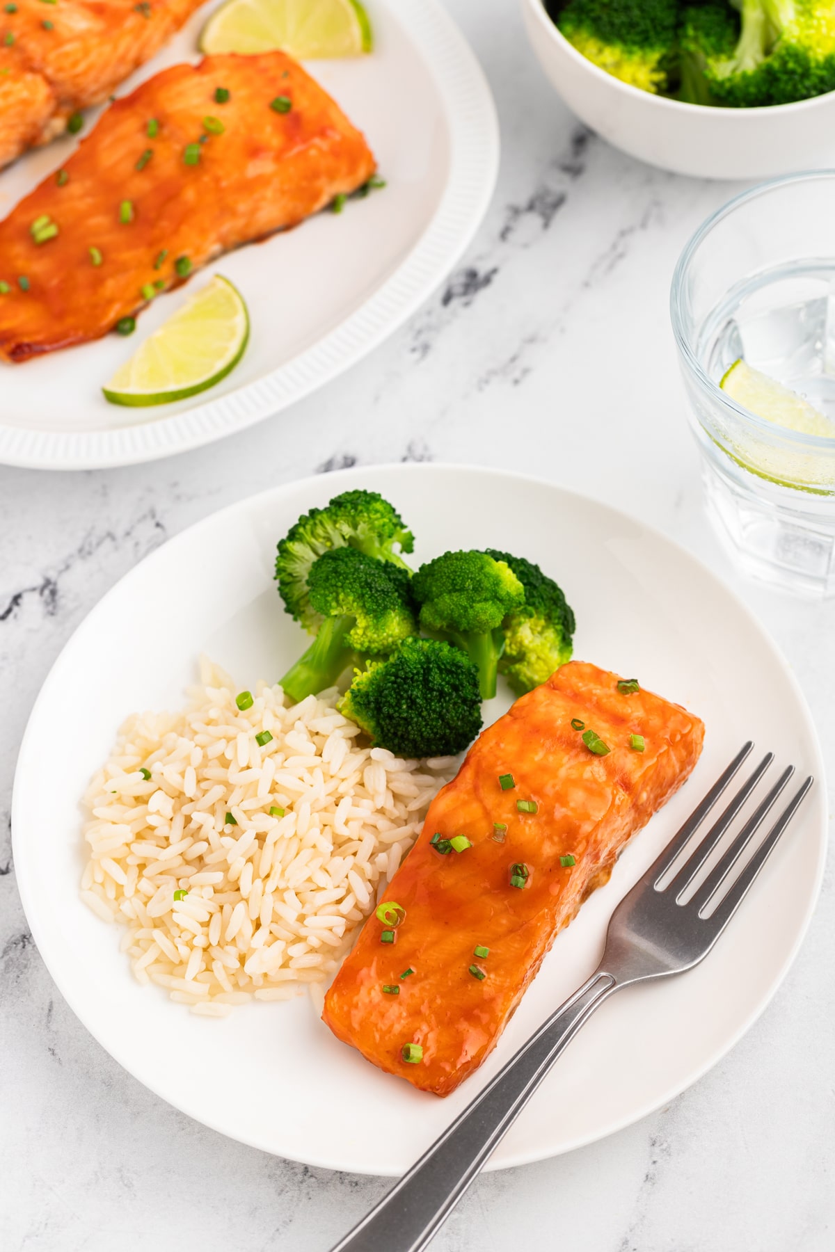 Honey Glazed Salmon with veggies and rice on a plate
