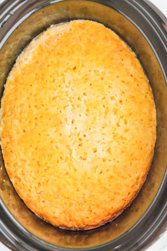 lookin into a slow cooker with cornbread in it,