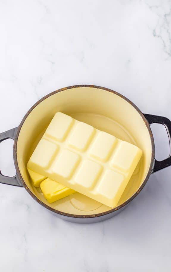 butter and white almond bark in cast iron pan.