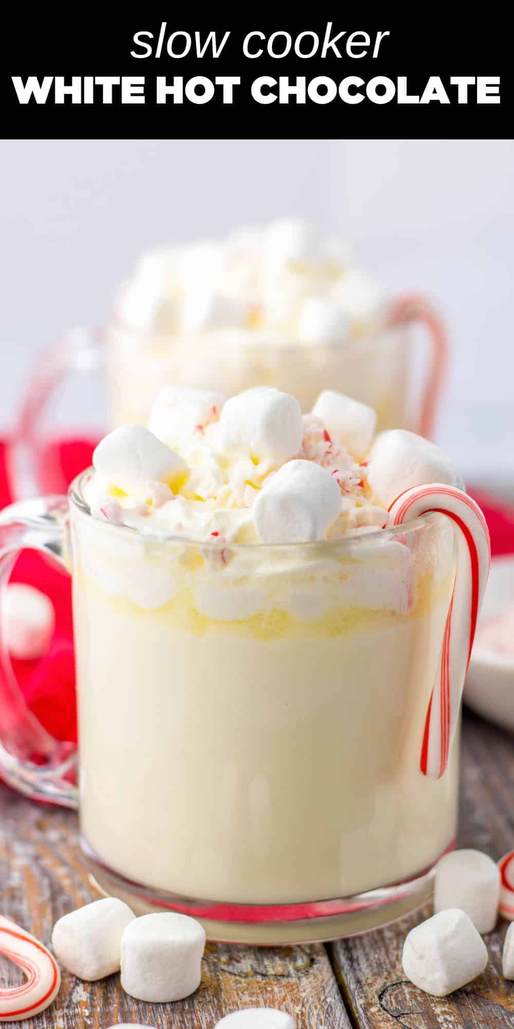 This Slow Cooker White Hot Chocolate is the perfect drink all season long. Rich white hot chocolate is flavored perfectly with peppermint and garnished with whipped cream, marshmallows and crushed peppermint. It is so festive and will warm you right up.