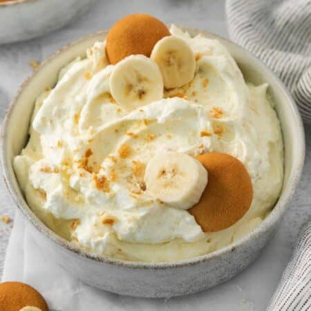 A bowl of Banana Pudding Dip with cookies.