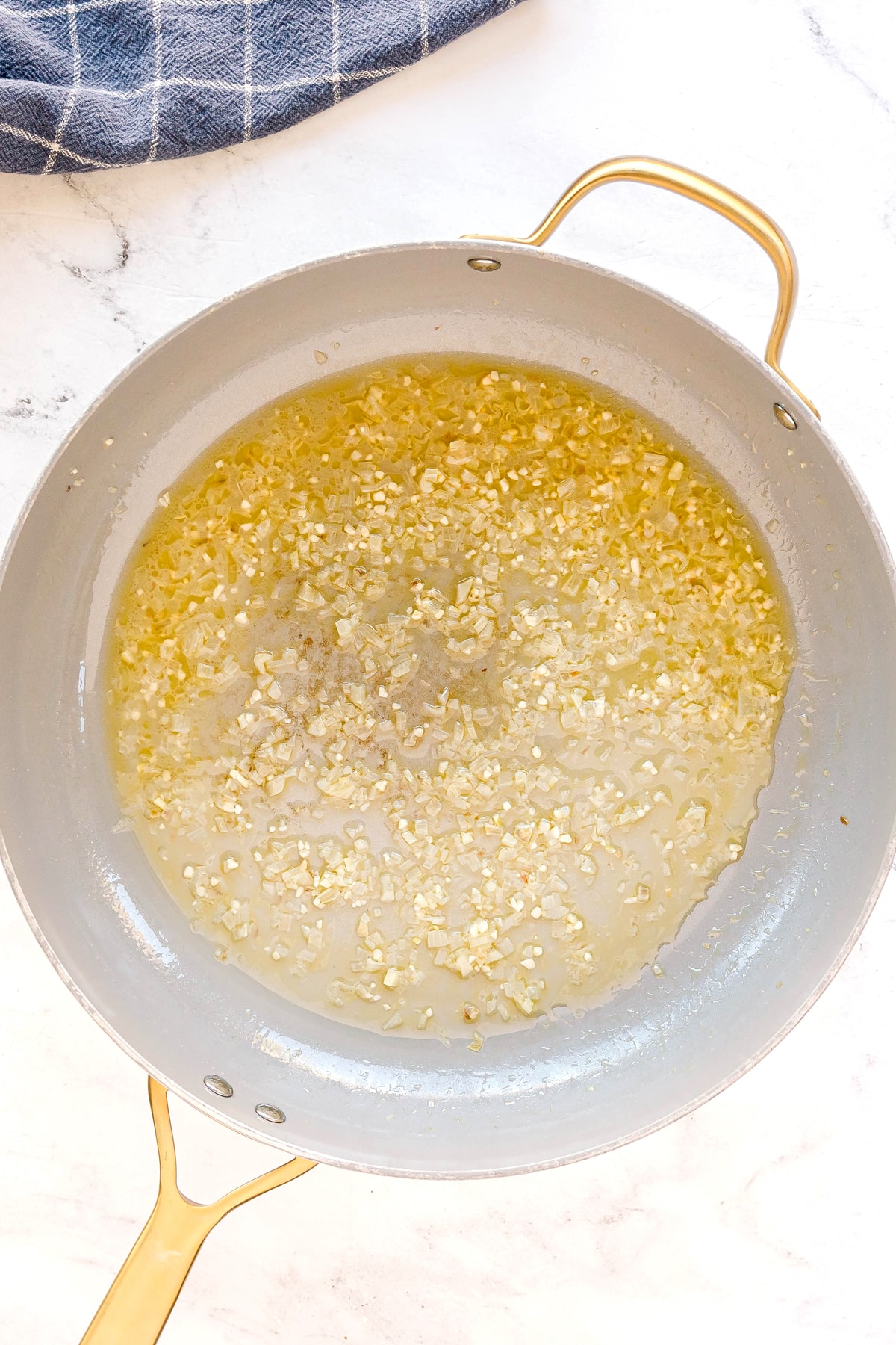 Next step in preparing Pasta Alla Vodka recipe is to add the vodka.