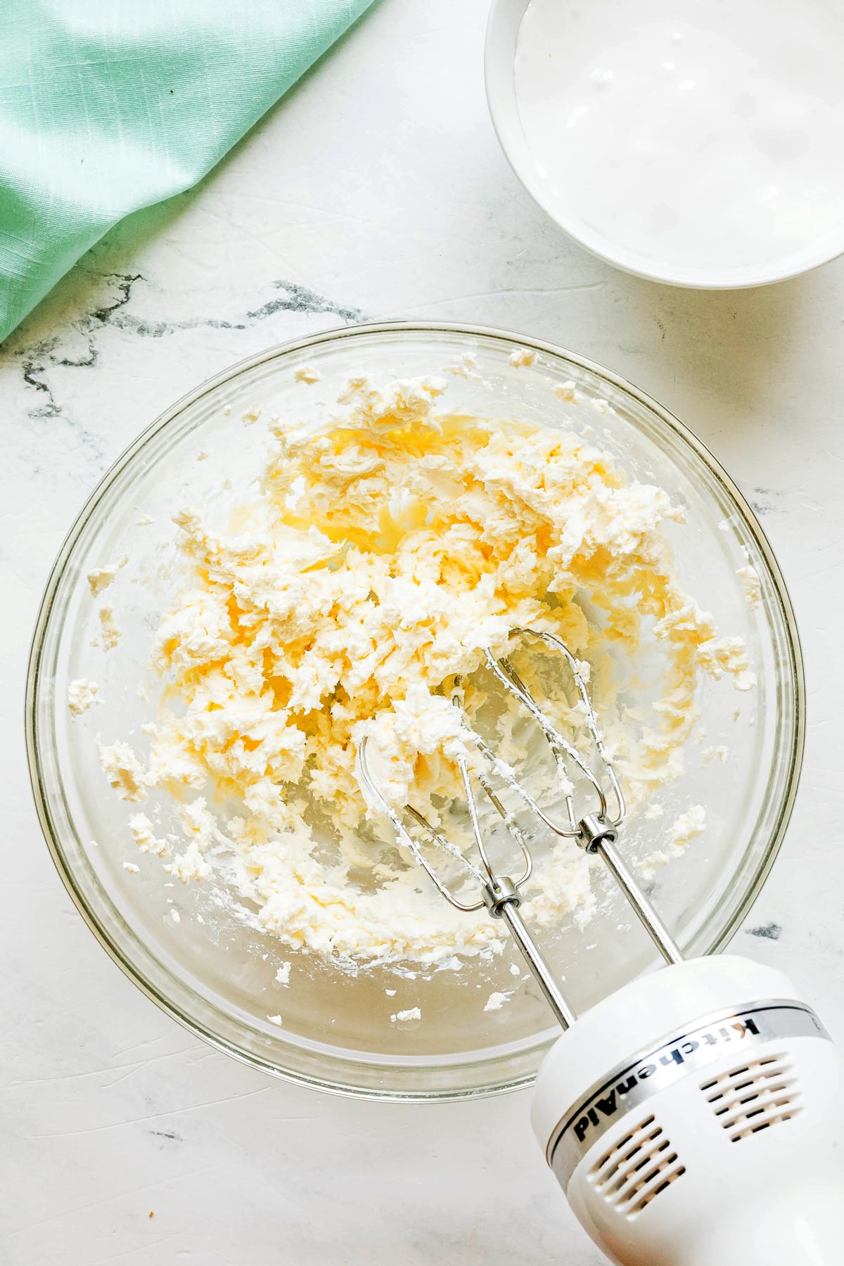 First step in preparing Easy Fruit Dip is to beat soften cream cheese in a bowl.