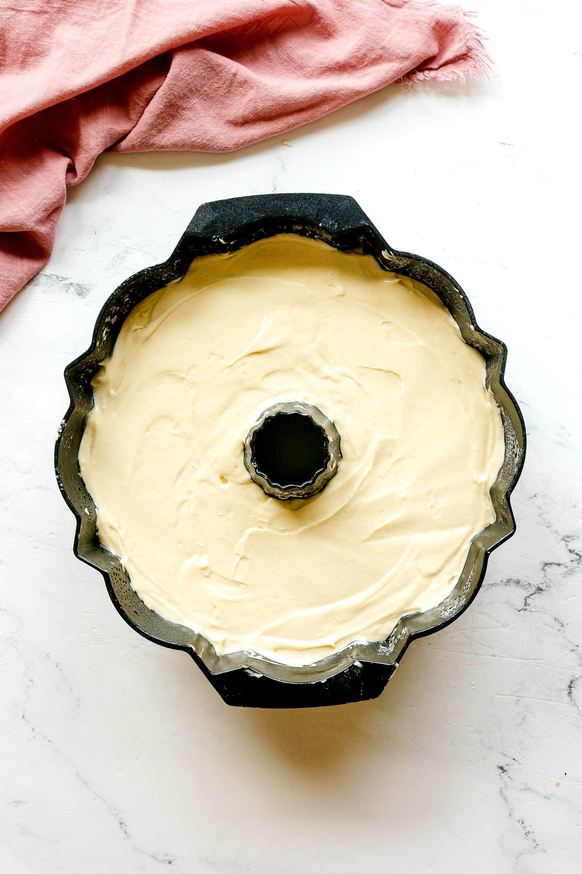 Paula Deen Pound Cake batter in bundt pan ready for baking.